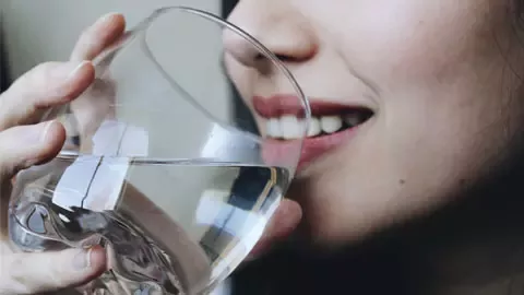 woman drinking water