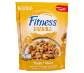 Nestlé Fitness Granola Honey flavor cereal with milk in a bowl, yellow packaging with health and design labels.